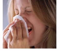 Girl sneezing